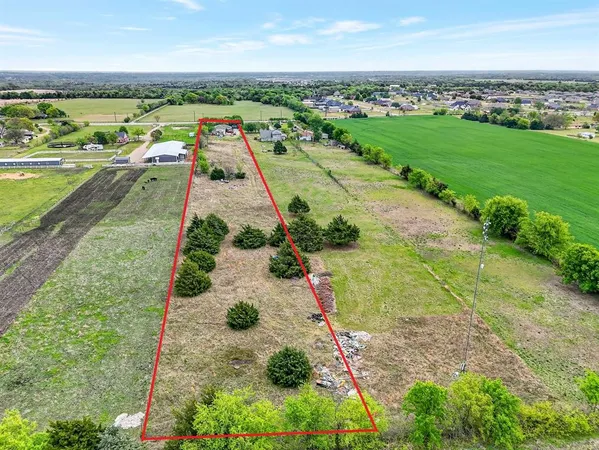 an aerial view of a city with lots of residential buildings