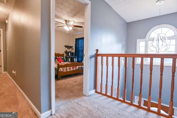 a view of a livingroom from a hallway