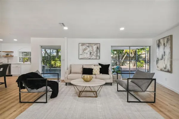 a living room with furniture and a window