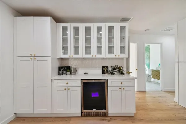 a kitchen with stainless steel appliances granite countertop a stove and a refrigerator