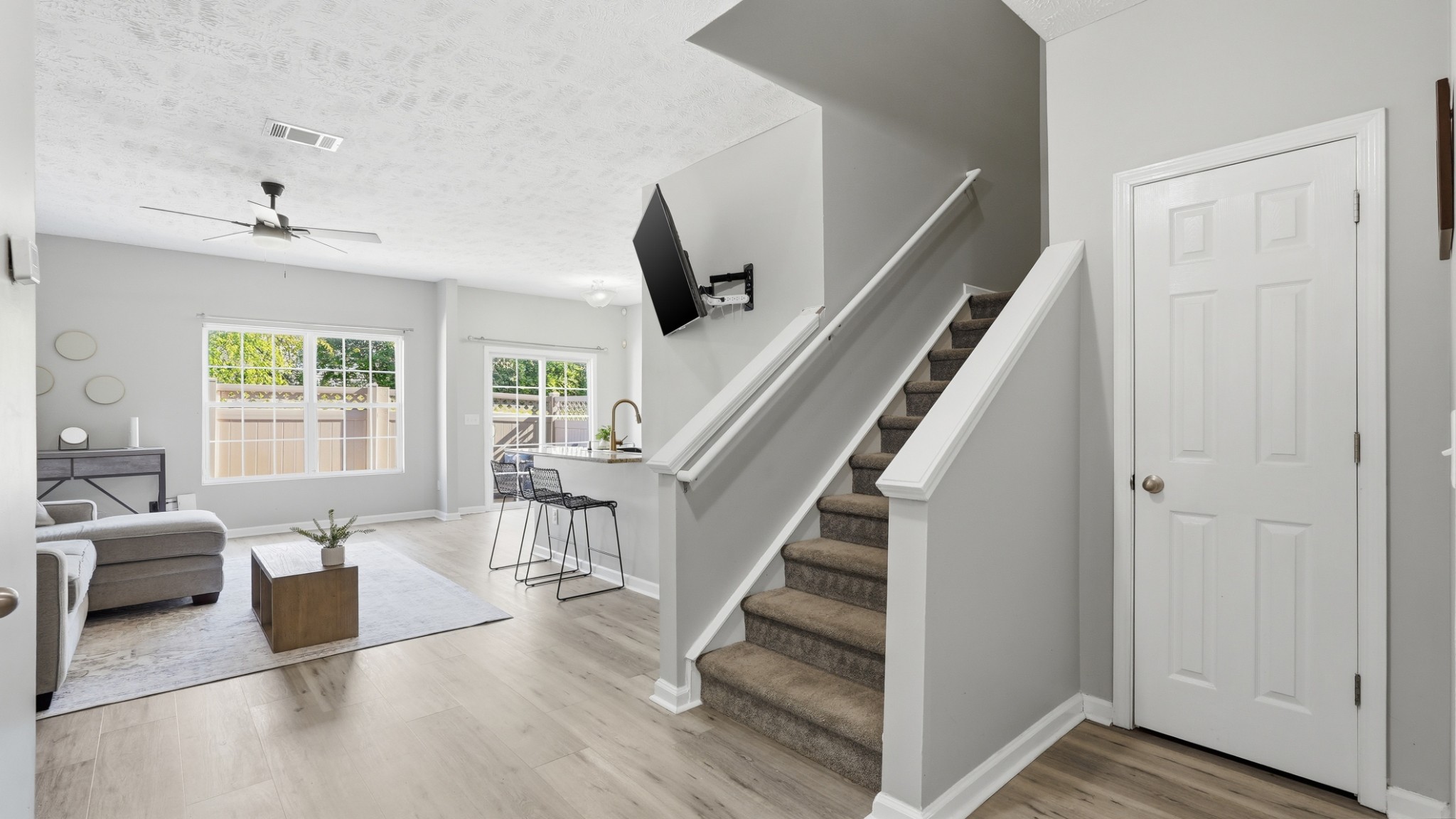 8215 Rossi Road Brentwood, TN 37027 - Photo 12 of 22 a view of entryway and livingroom with furniture