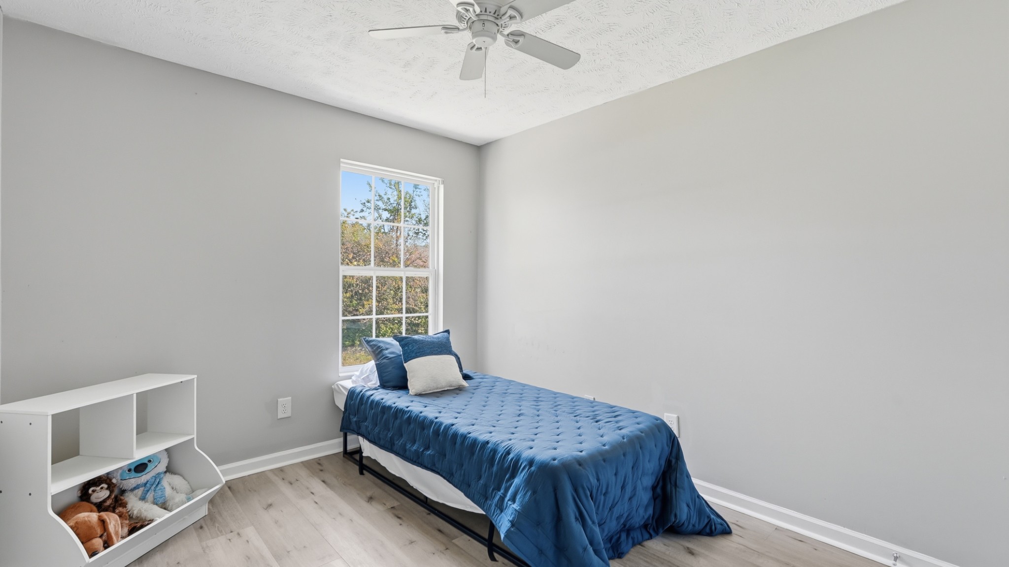 8215 Rossi Road Brentwood, TN 37027 - Photo 16 of 22 a bedroom with a bed and a window