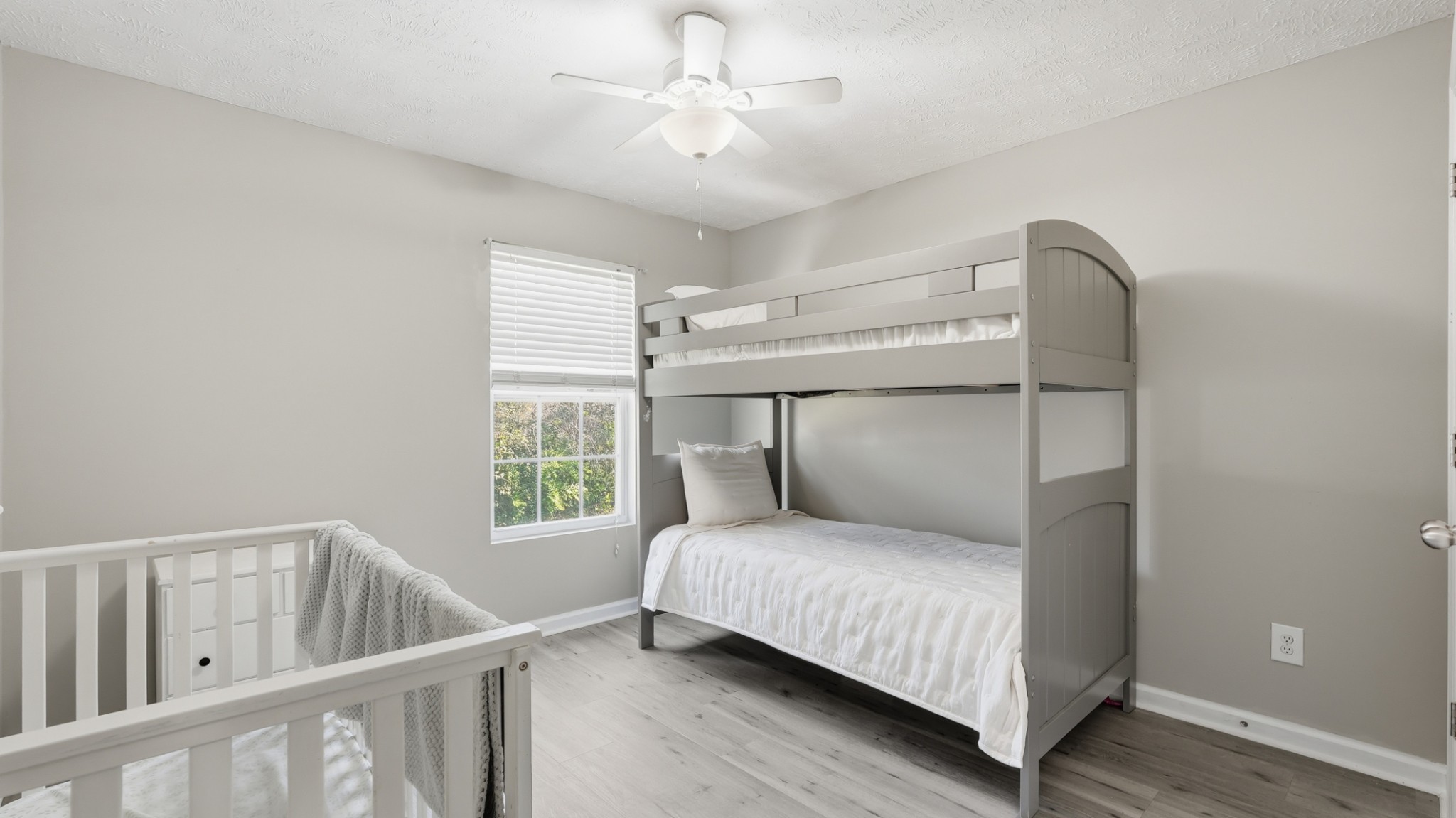 8215 Rossi Road Brentwood, TN 37027 - Photo 18 of 22 a bedroom with a bed window and a window