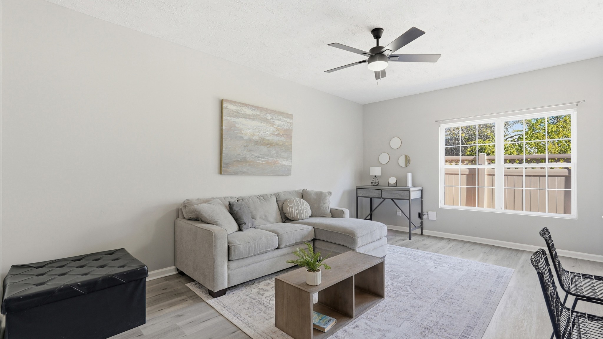 8215 Rossi Road Brentwood, TN 37027 - Photo 3 of 22 a living room with furniture and a window