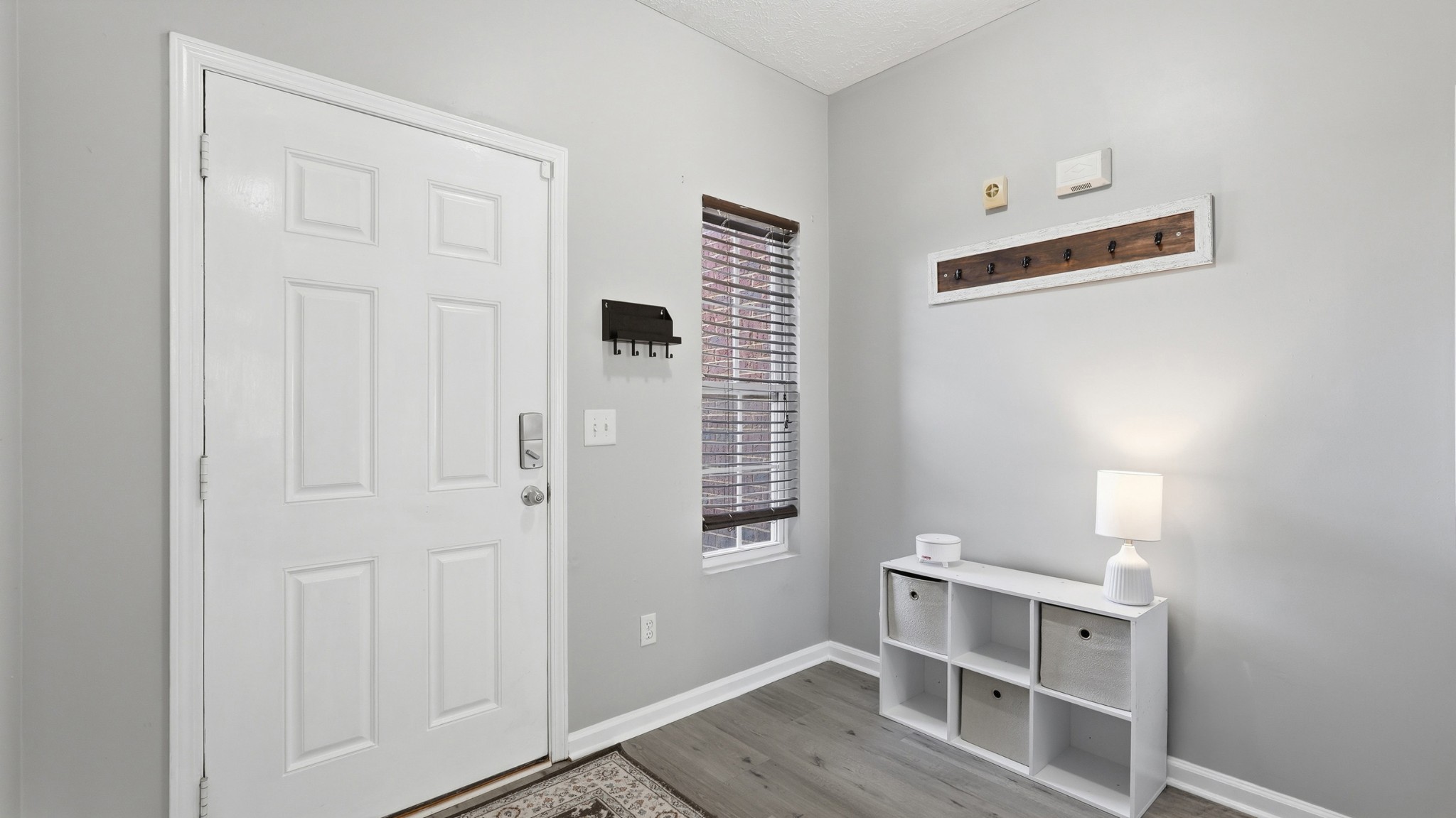 8215 Rossi Road Brentwood, TN 37027 - Photo 4 of 22 a view of room with window and wooden floor