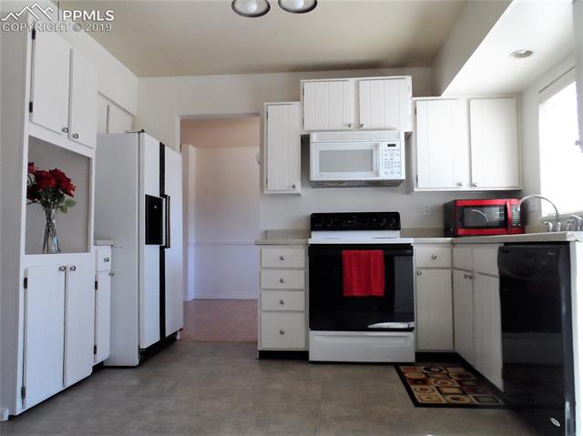 1611 Wooten Road Colorado Springs, CO 80915 - Photo 8 of 28 Gallery Image 8