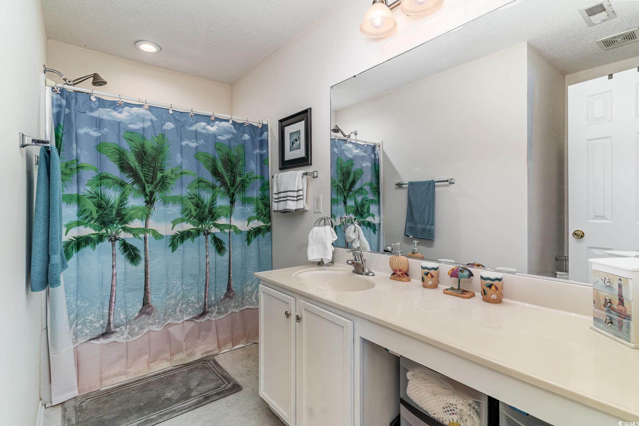 316 Kiskadee Loop, Unit 9E Conway, SC 29526 - Photo 22 of 40 Bathroom with a shower with curtain, concrete floo
