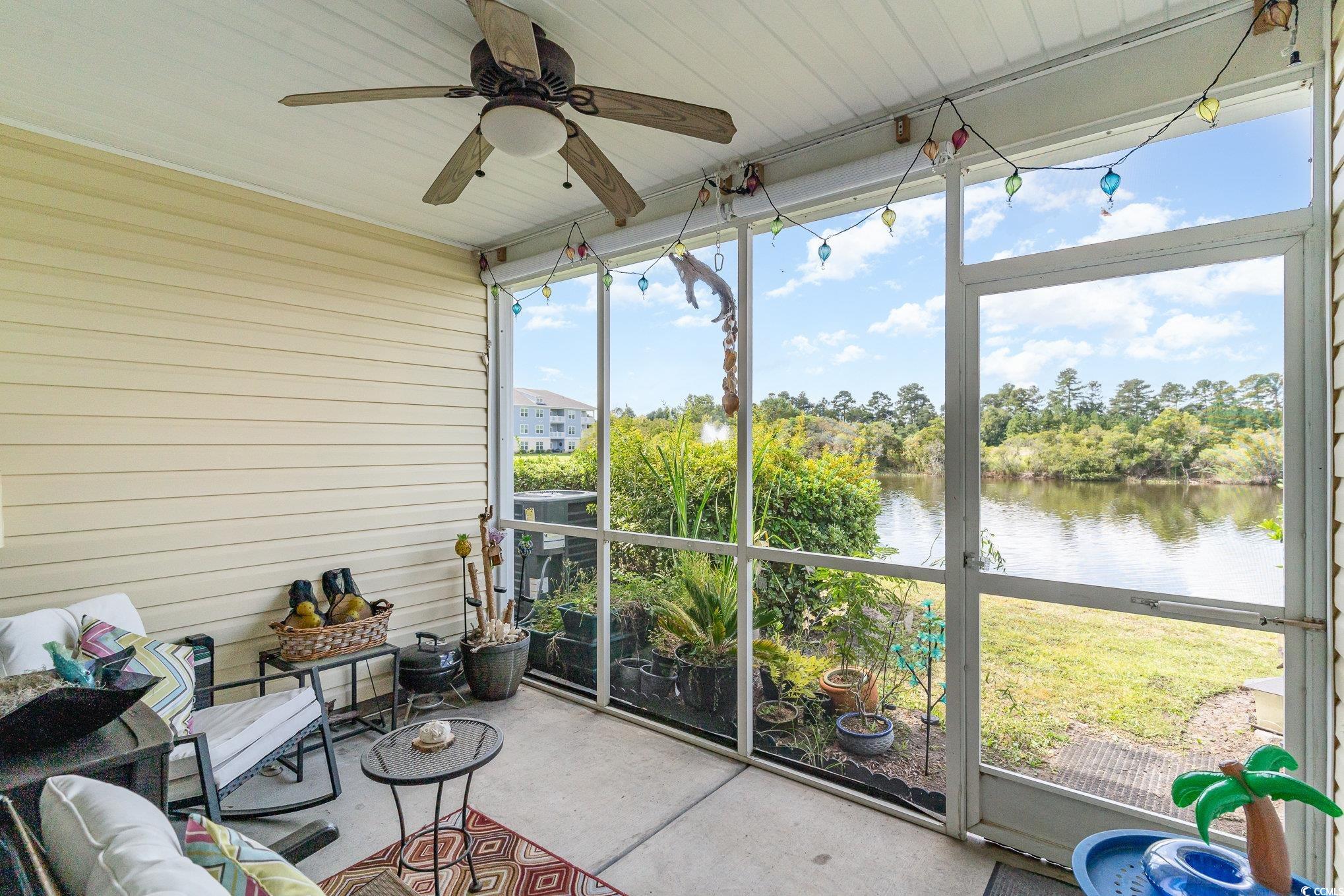 316 Kiskadee Loop, Unit 9E Conway, SC 29526 - Photo 29 of 40 Sunroom / solarium with a water view, ceiling fan,