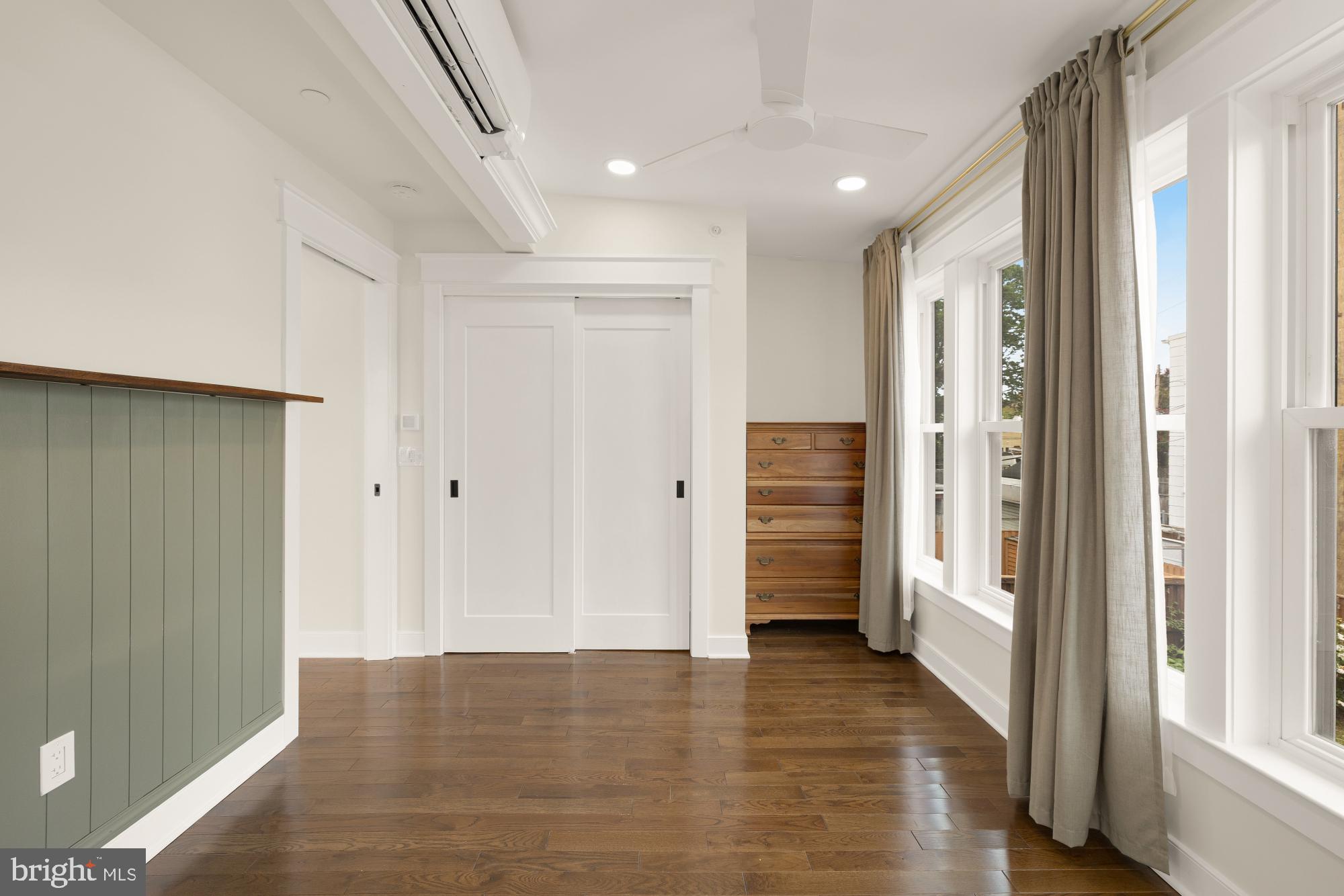 336 Channing Street Northeast, Unit A Washington, DC 20002 - Photo 17 of 28 a view of a hallway with wooden floor and closet area