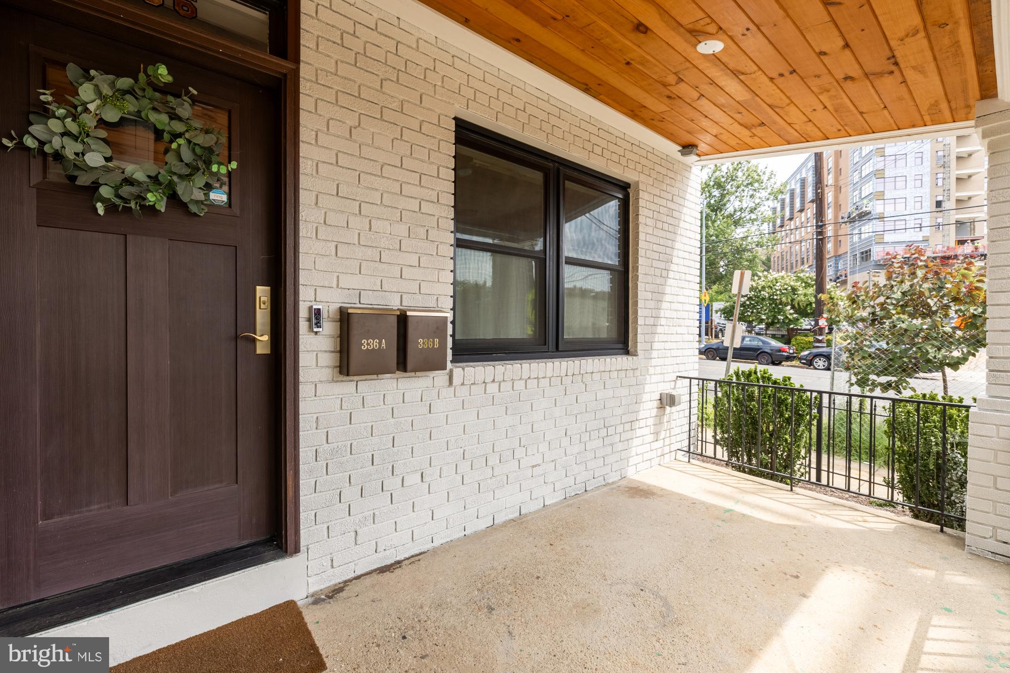 336 Channing Street Northeast, Unit A Washington, DC 20002 - Photo 3 of 28 a front view of a house with a large window