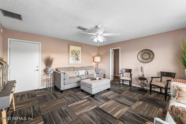 a backyard of a house with a garden and deck