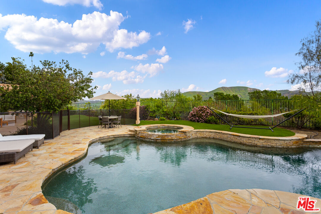 3910 Leighton Point Road Calabasas, CA 91301 - Photo 26 of 29 a view of swimming pool and lake view