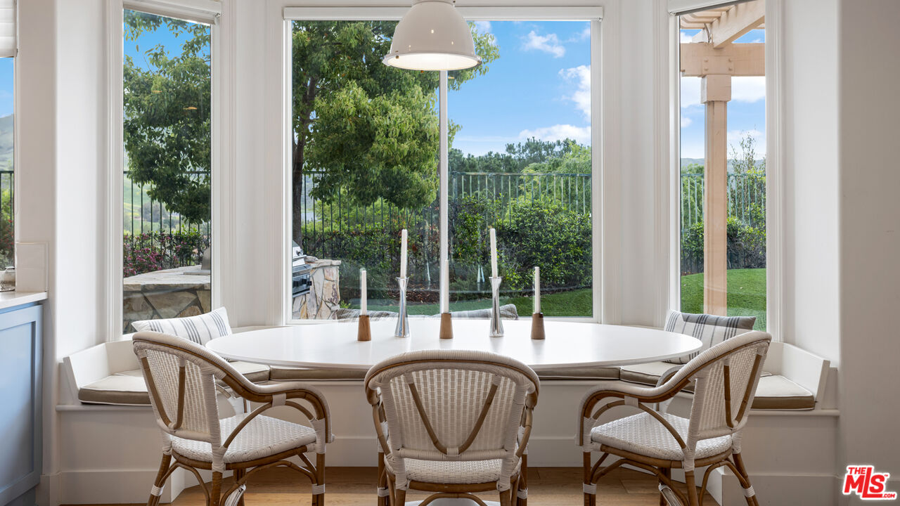 3910 Leighton Point Road Calabasas, CA 91301 - Photo 10 of 29 a dining room with furniture and window