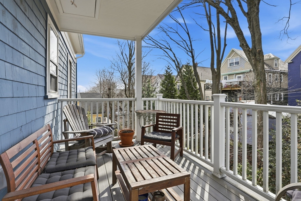 85 Jamaica Street, Unit 3 Boston, MA 02130 - Photo 15 of 19 a view of a chairs on the roof deck