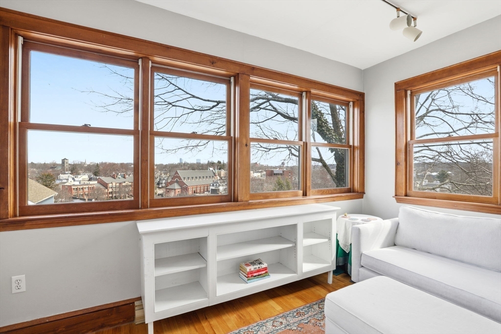 85 Jamaica Street, Unit 3 Boston, MA 02130 - Photo 6 of 19 a living room with furniture and a window