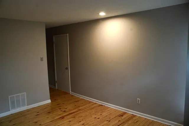 a view of a room with racks on the wall