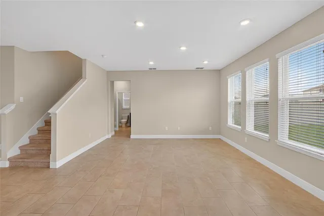 a white bath tub sitting next to a white sink