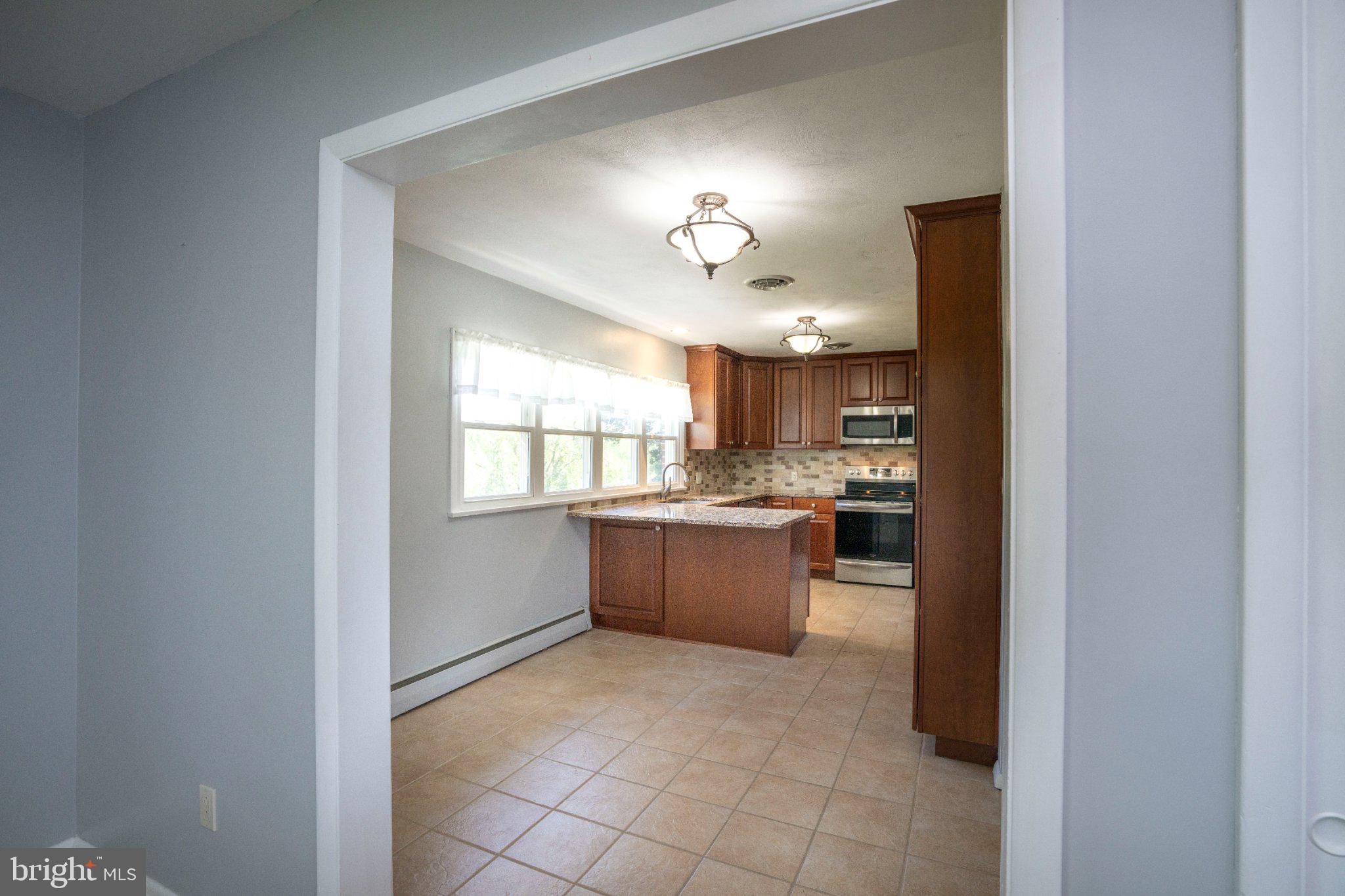 1639 Houserville Road State College, PA 16801 - Photo 18 of 54 Inviting kitchen with modern finishes.