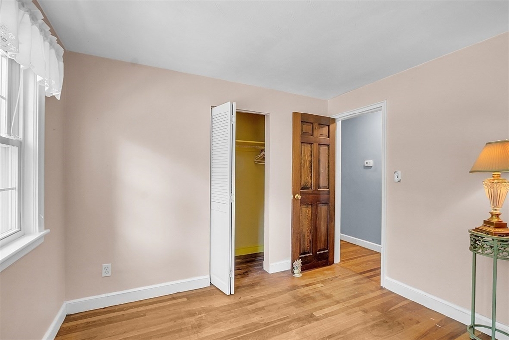 4 Whittemore Road Framingham, MA 01701 - Photo 24 of 36 an empty room with wooden floor and closet