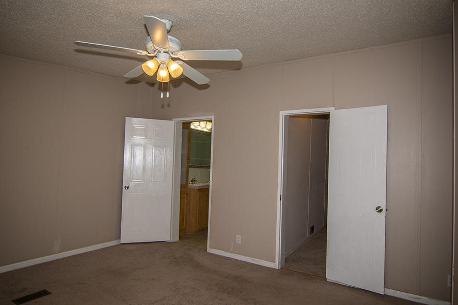 4821 Ashemont Road Aberdeen, NC 28315 - Photo 13 of 40 master bedroom_doors open_2019_6783