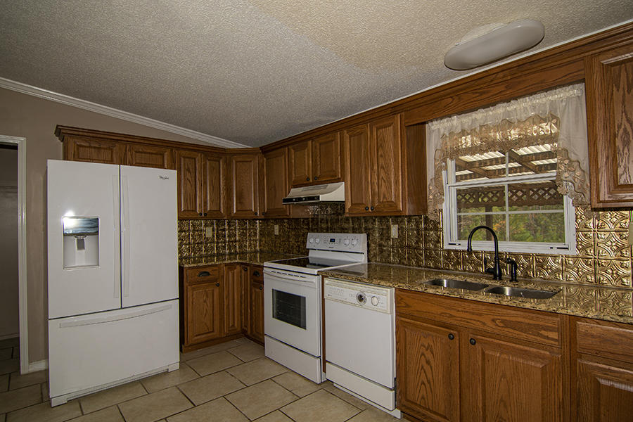 4821 Ashemont Road Aberdeen, NC 28315 - Photo 5 of 40 kitchen_no rug_2019_6737
