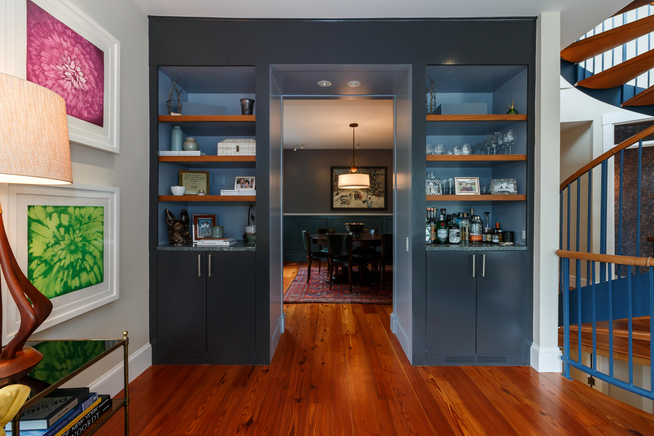 52 Point Street Provincetown, MA 02657 - Photo 11 of 35 a kitchen with stainless steel appliances wooden floor and a book shelf