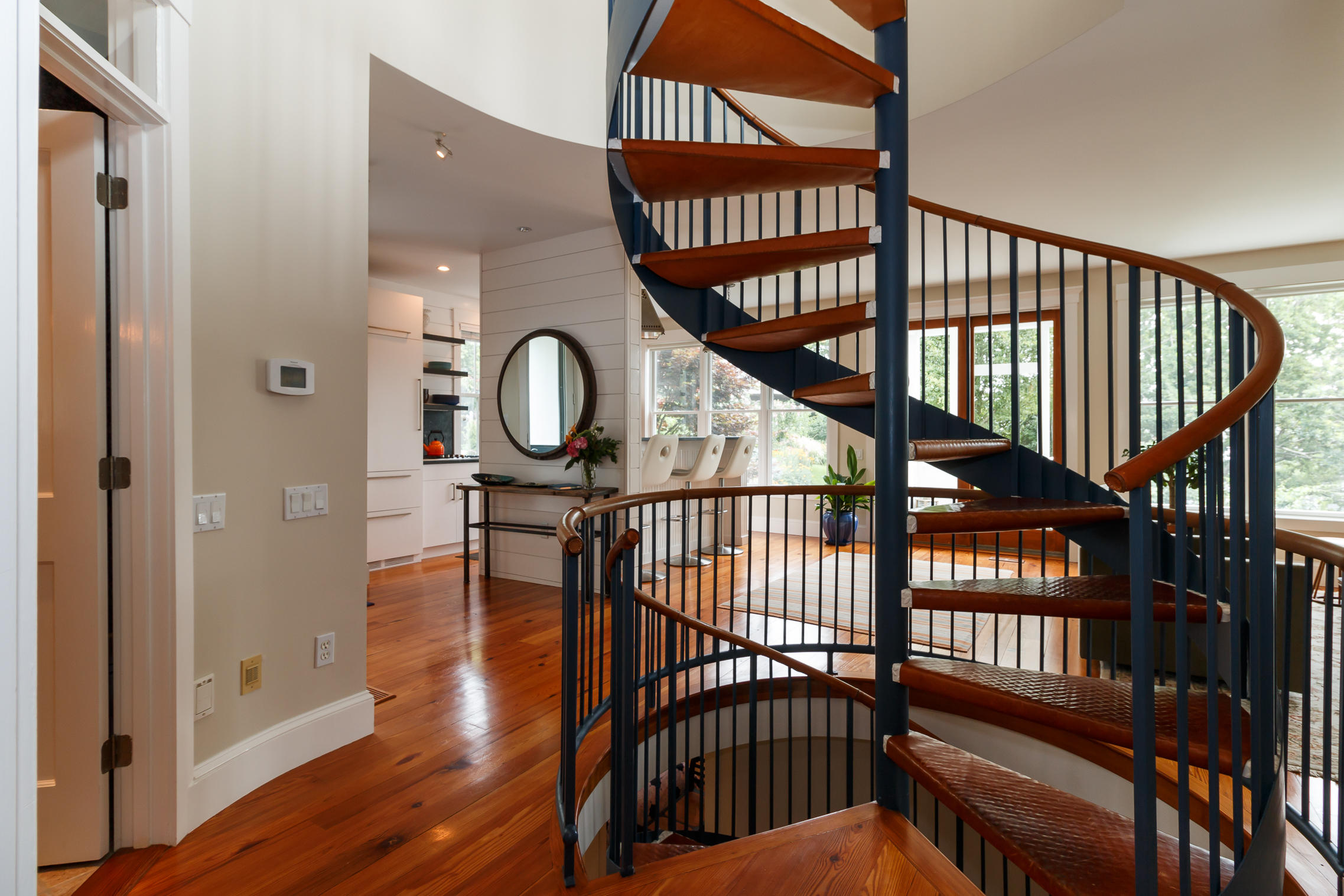 52 Point Street Provincetown, MA 02657 - Photo 15 of 35 a view of staircase with railing and a chandelier