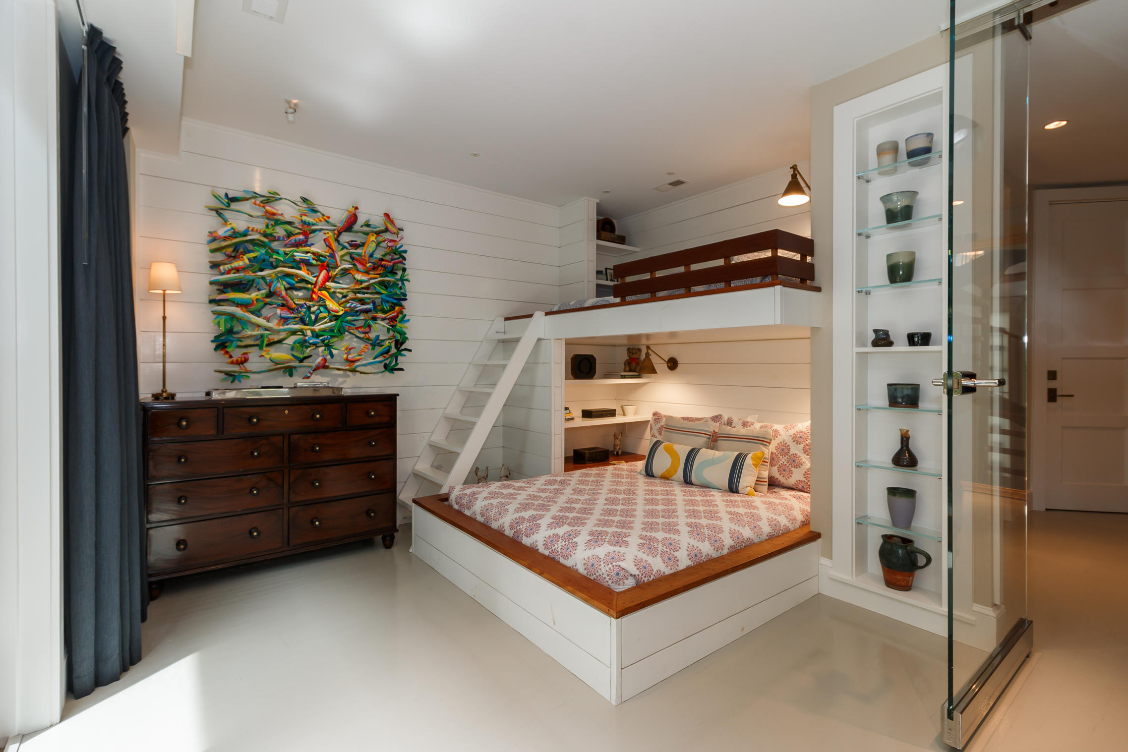 52 Point Street Provincetown, MA 02657 - Photo 20 of 35 a bedroom with a bed and a window