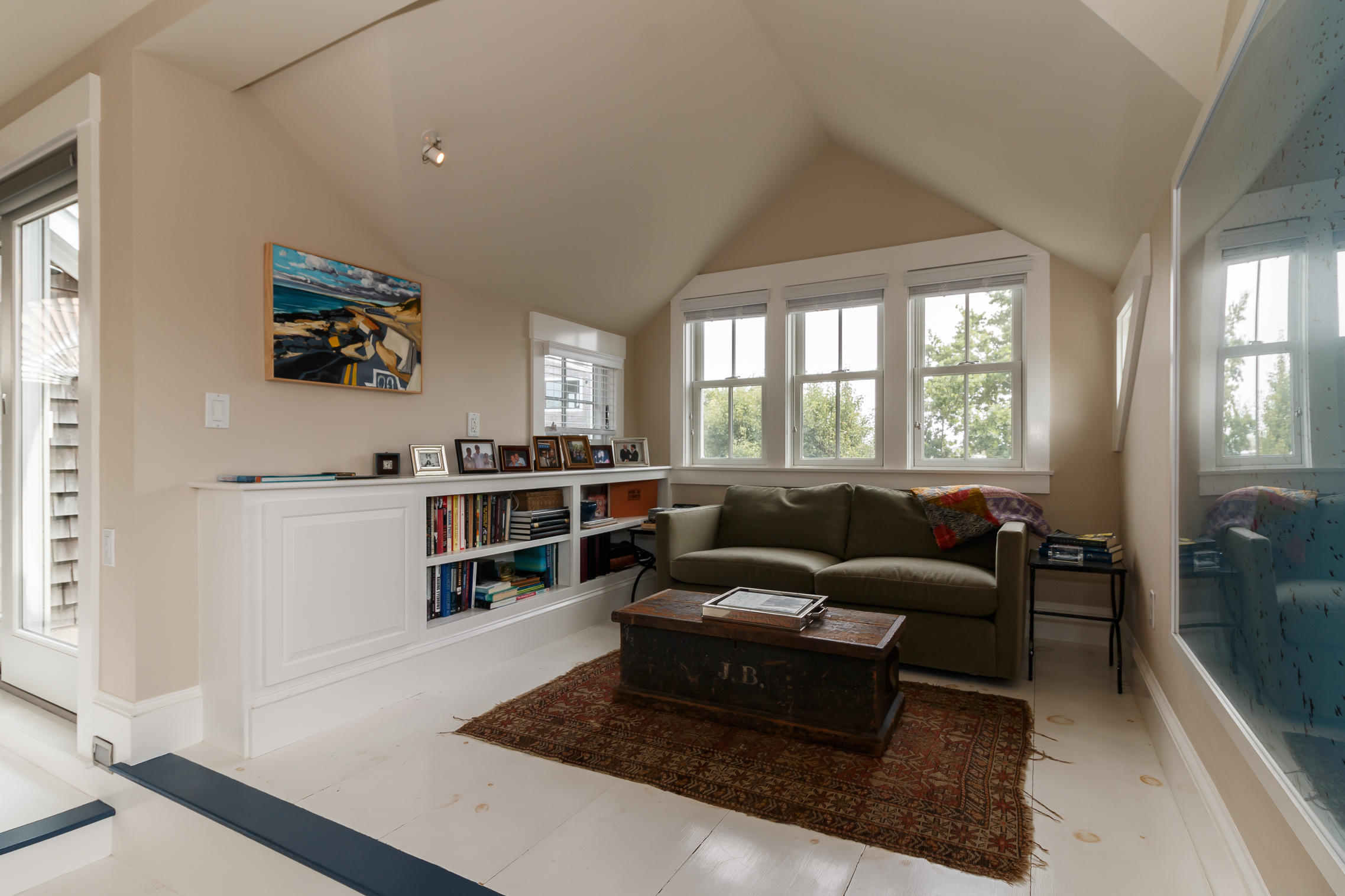52 Point Street Provincetown, MA 02657 - Photo 25 of 35 a living room with furniture and a window