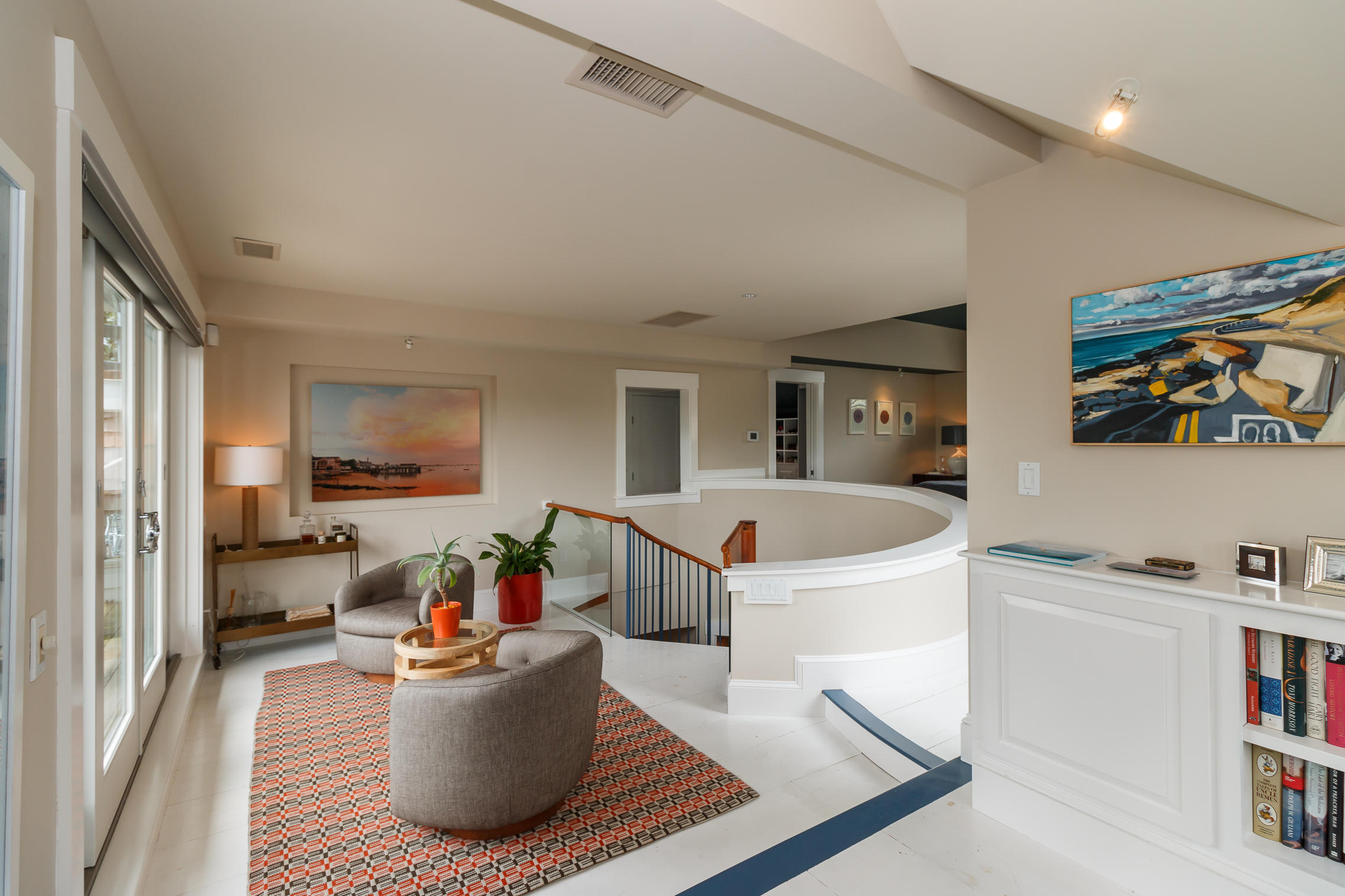 52 Point Street Provincetown, MA 02657 - Photo 26 of 35 a living room with furniture and a wooden floor