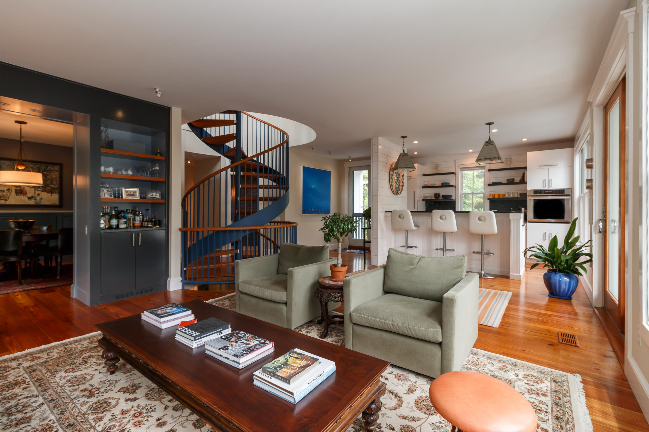 52 Point Street Provincetown, MA 02657 - Photo 10 of 35 a living room with furniture and a rug