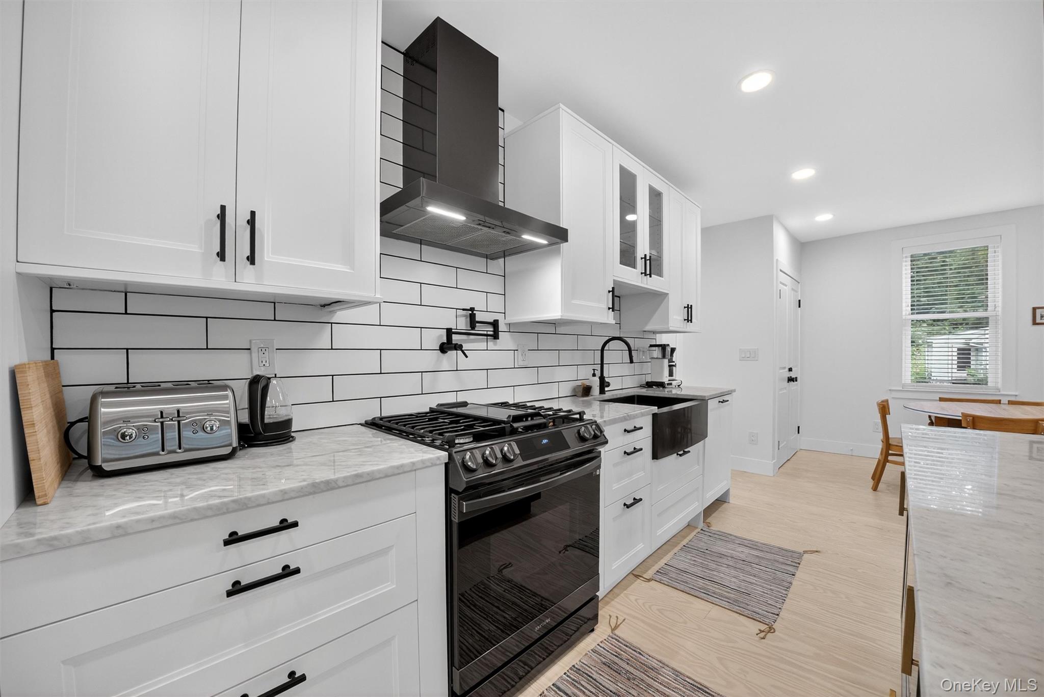 39 Frost Lane Cornwall, NY 12518 - Photo 12 of 39 a kitchen with stainless steel appliances granite countertop a stove a sink and a refrigerator
