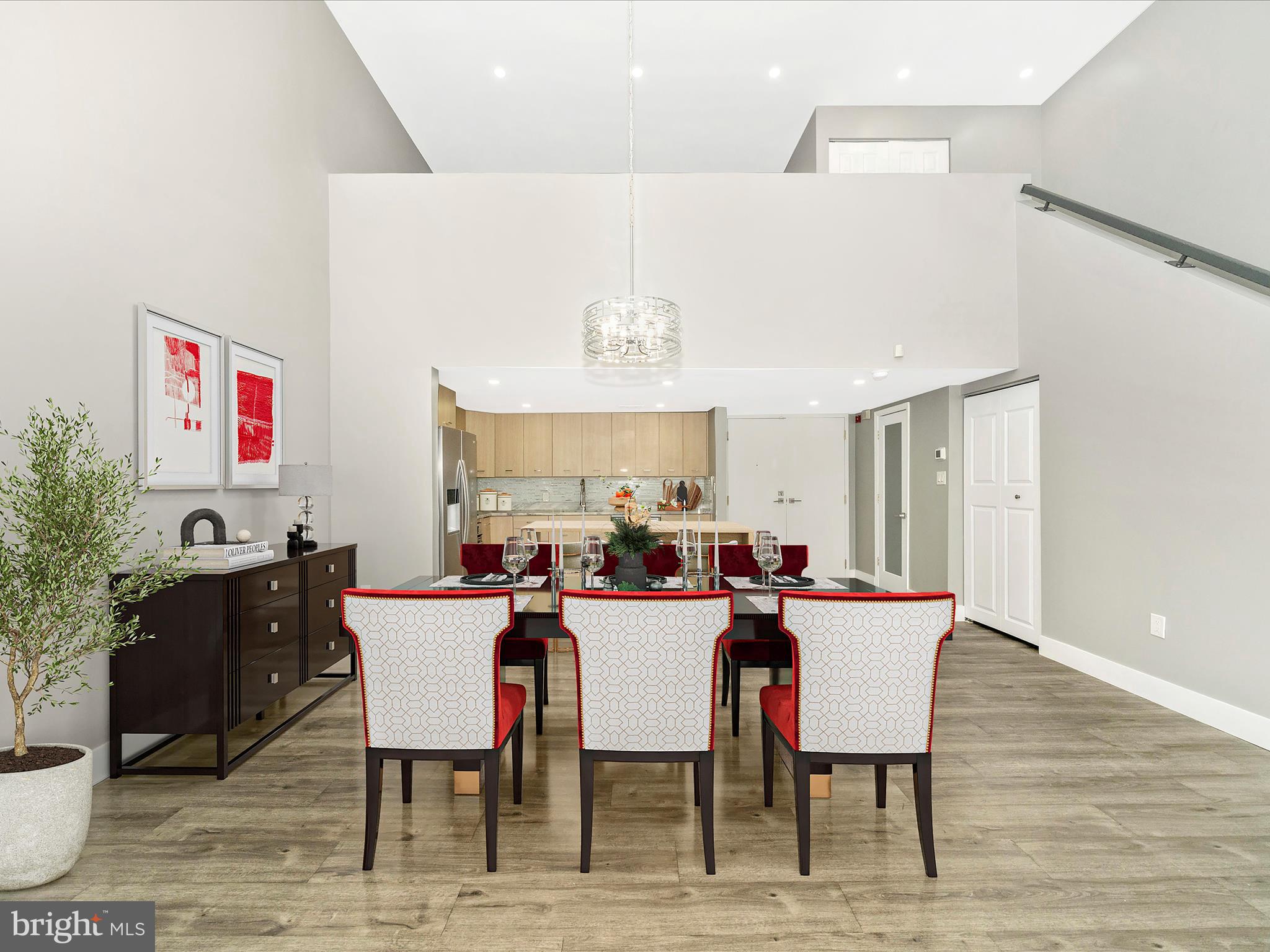 1040 Deer Ridge Drive, Unit 508 Baltimore, MD 21210 - Photo 16 of 66 a view of a dining room with furniture and wooden floor