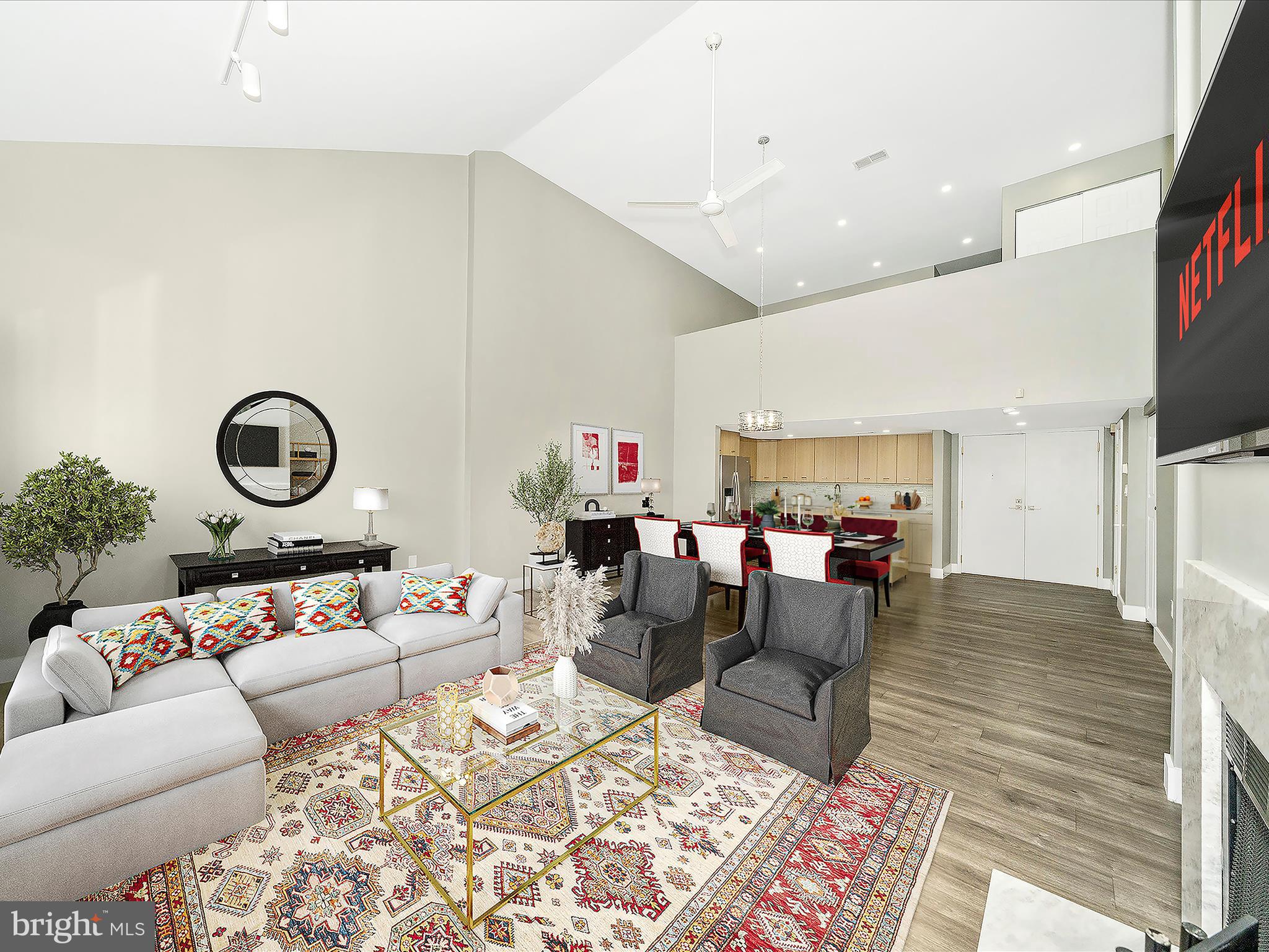 1040 Deer Ridge Drive, Unit 508 Baltimore, MD 21210 - Photo 22 of 66 a living room with furniture and a flat screen tv