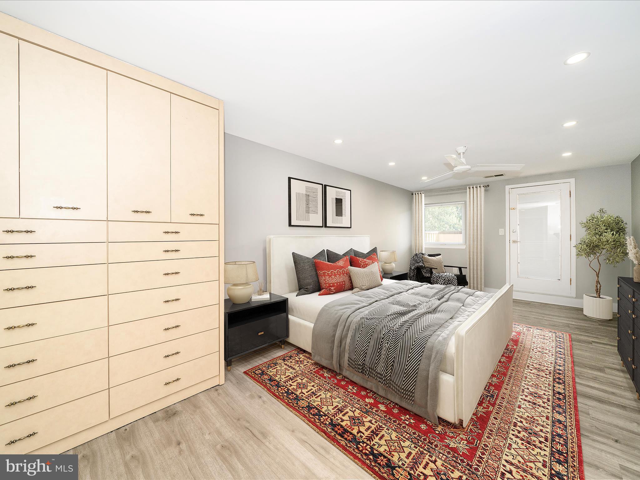 1040 Deer Ridge Drive, Unit 508 Baltimore, MD 21210 - Photo 50 of 66 a bedroom with a large bed and a window