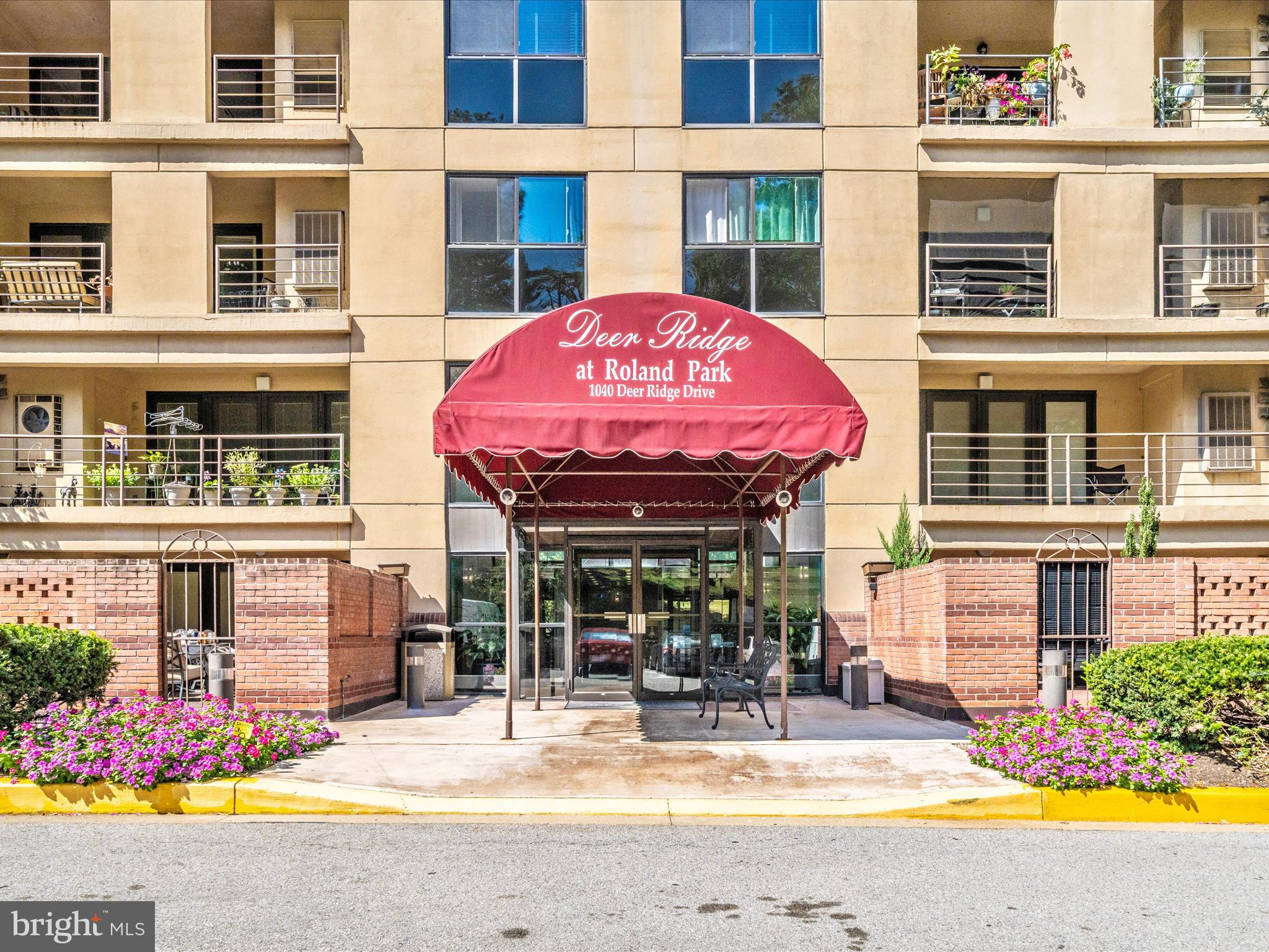1040 Deer Ridge Drive, Unit 508 Baltimore, MD 21210 - Photo 59 of 66 a view of building with sitting area