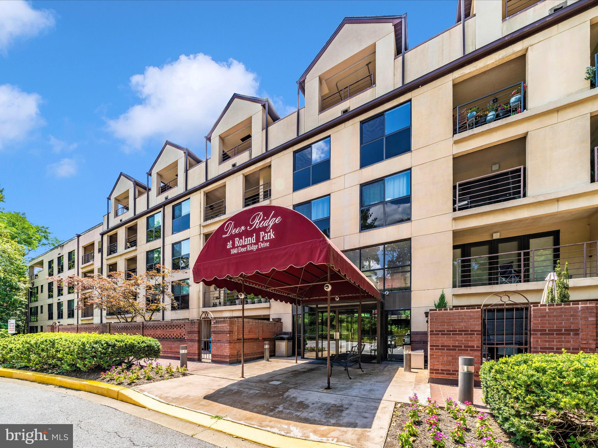 1040 Deer Ridge Drive, Unit 508 Baltimore, MD 21210 - Photo 64 of 66 a front view of a building with street view