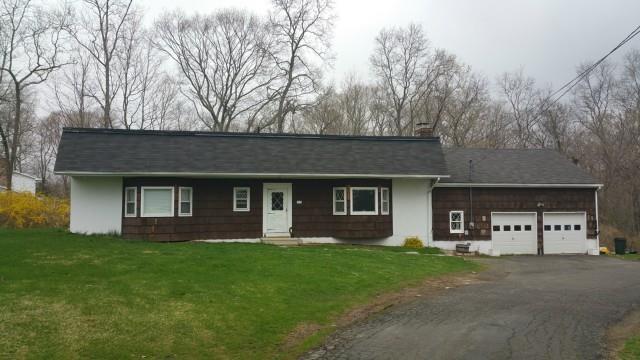300 Georgetown Road Weston, CT 06883 - Photo 1 of 1 a view of a house with a yard and large tree