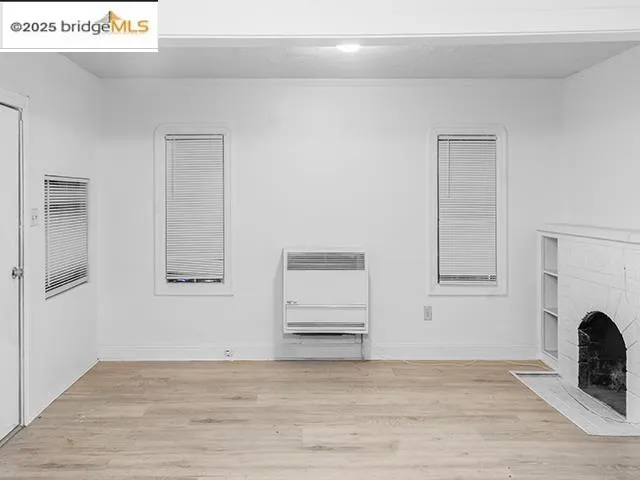 a view of a livingroom with a fireplace