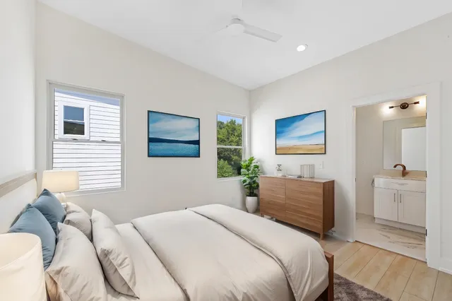 a bedroom with a bed and a couch