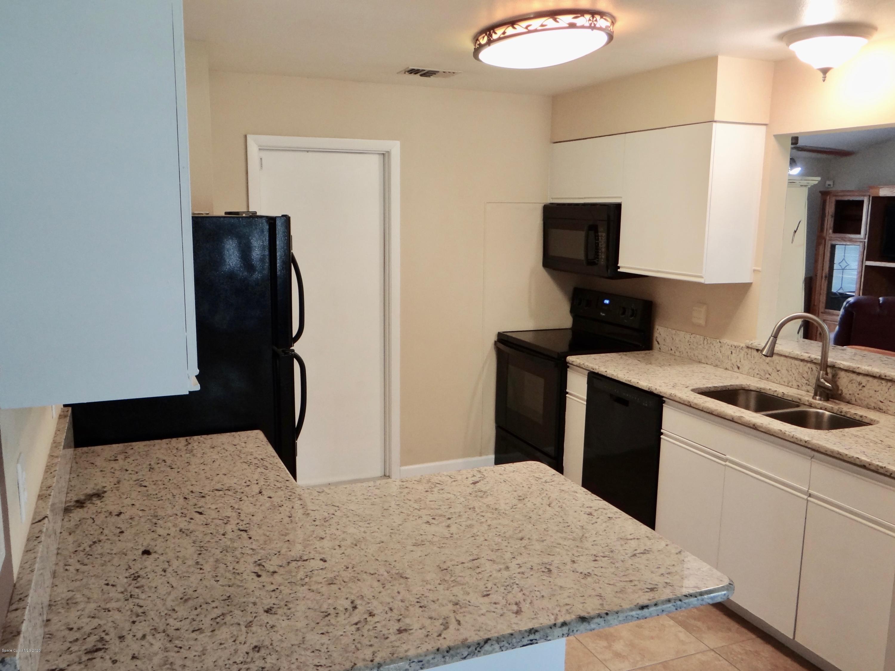 715 Seaton Road Southwest Palm Bay, FL 32908 - Photo 13 of 45 kitchen 2