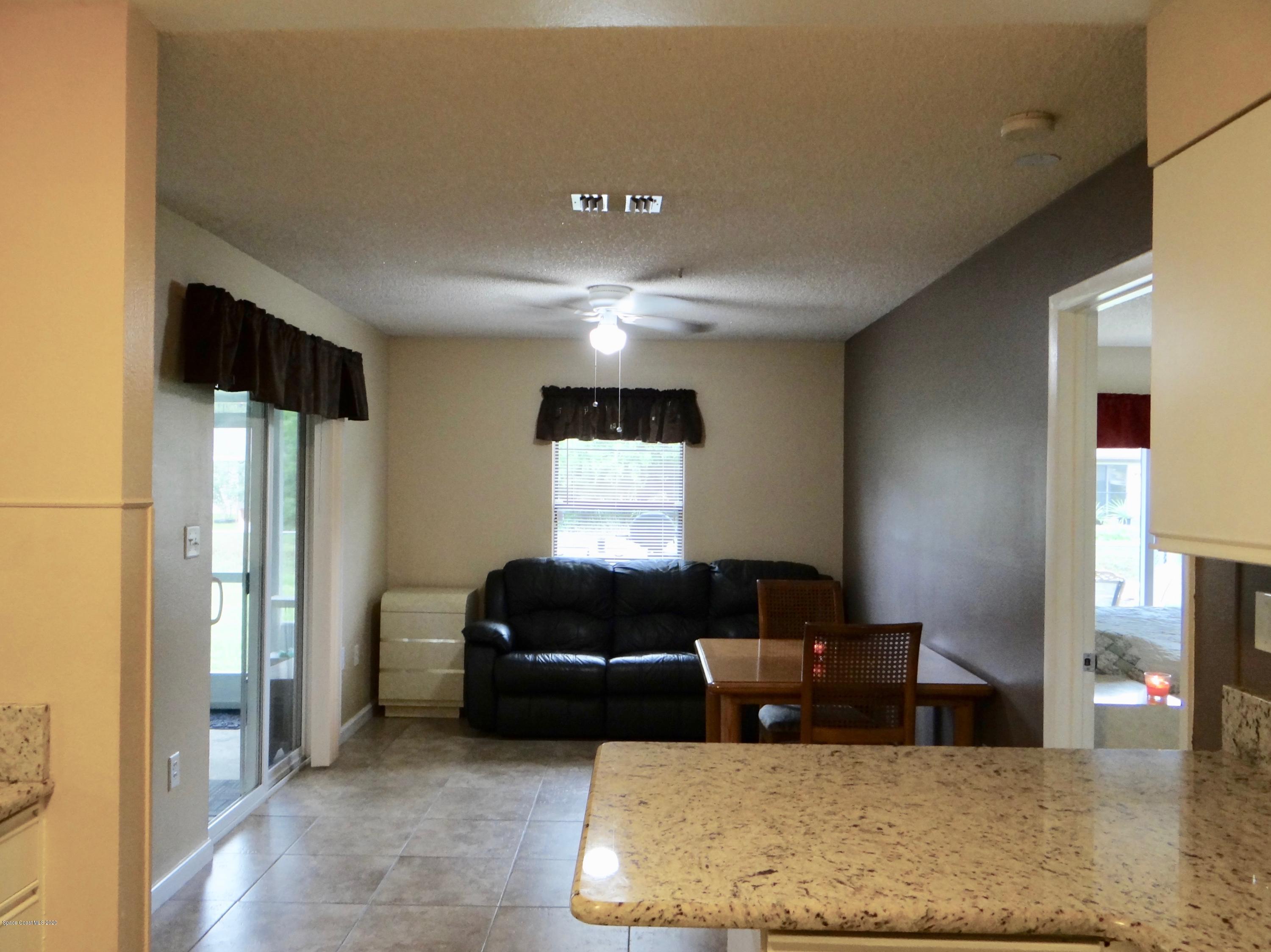715 Seaton Road Southwest Palm Bay, FL 32908 - Photo 15 of 45 family dining 2