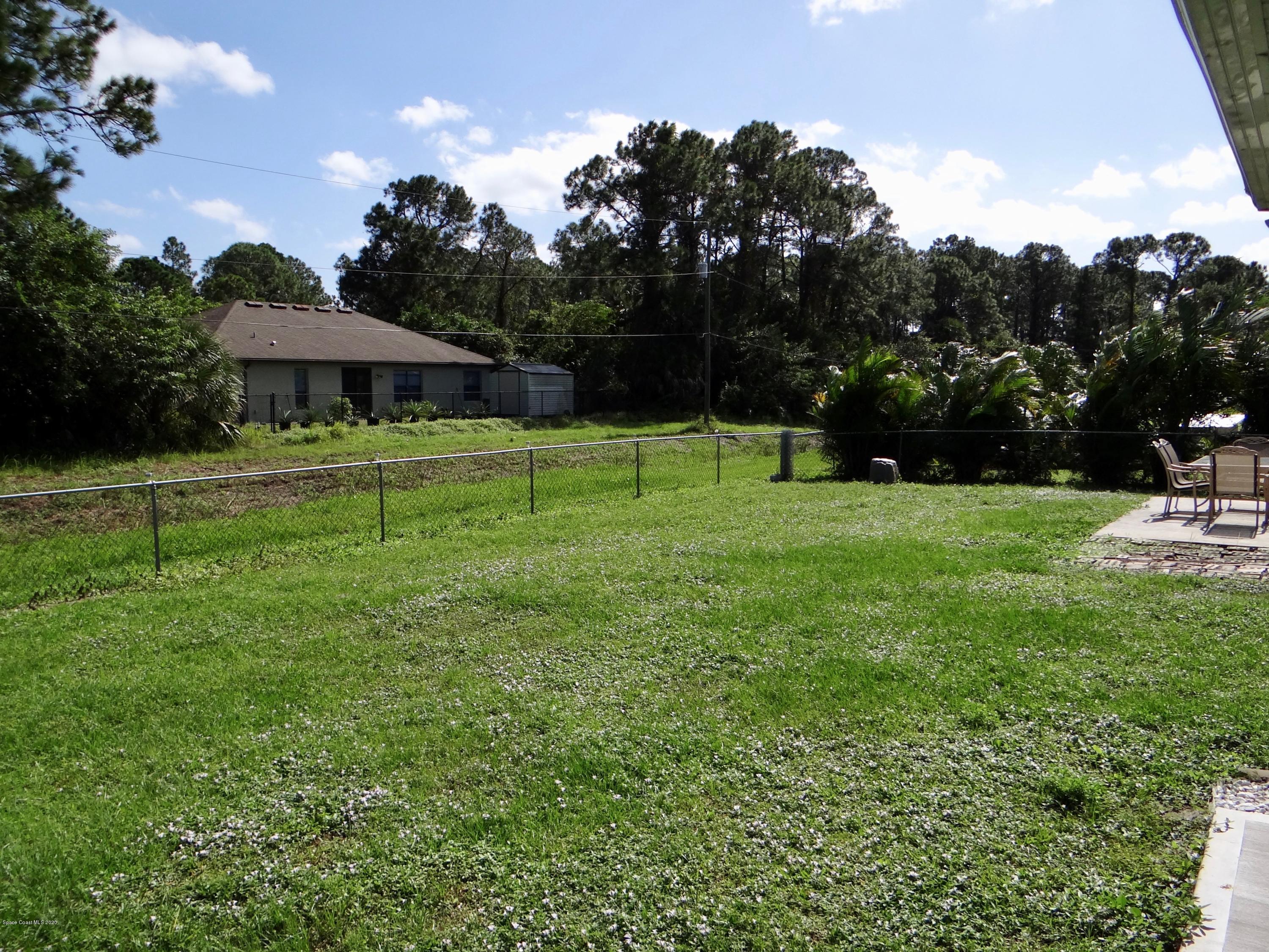 715 Seaton Road Southwest Palm Bay, FL 32908 - Photo 40 of 45 fenced part of backyard