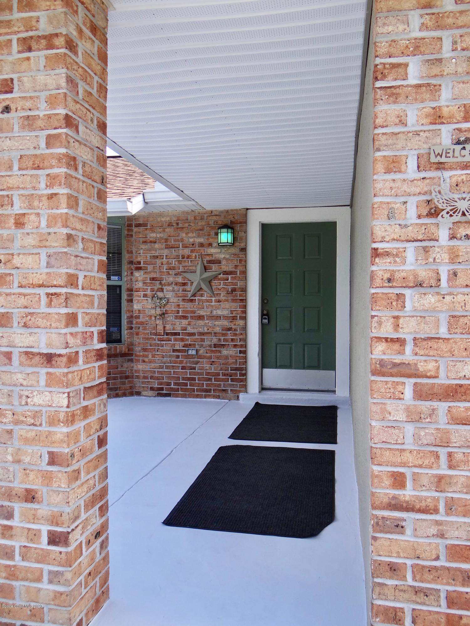 715 Seaton Road Southwest Palm Bay, FL 32908 - Photo 5 of 45 front door