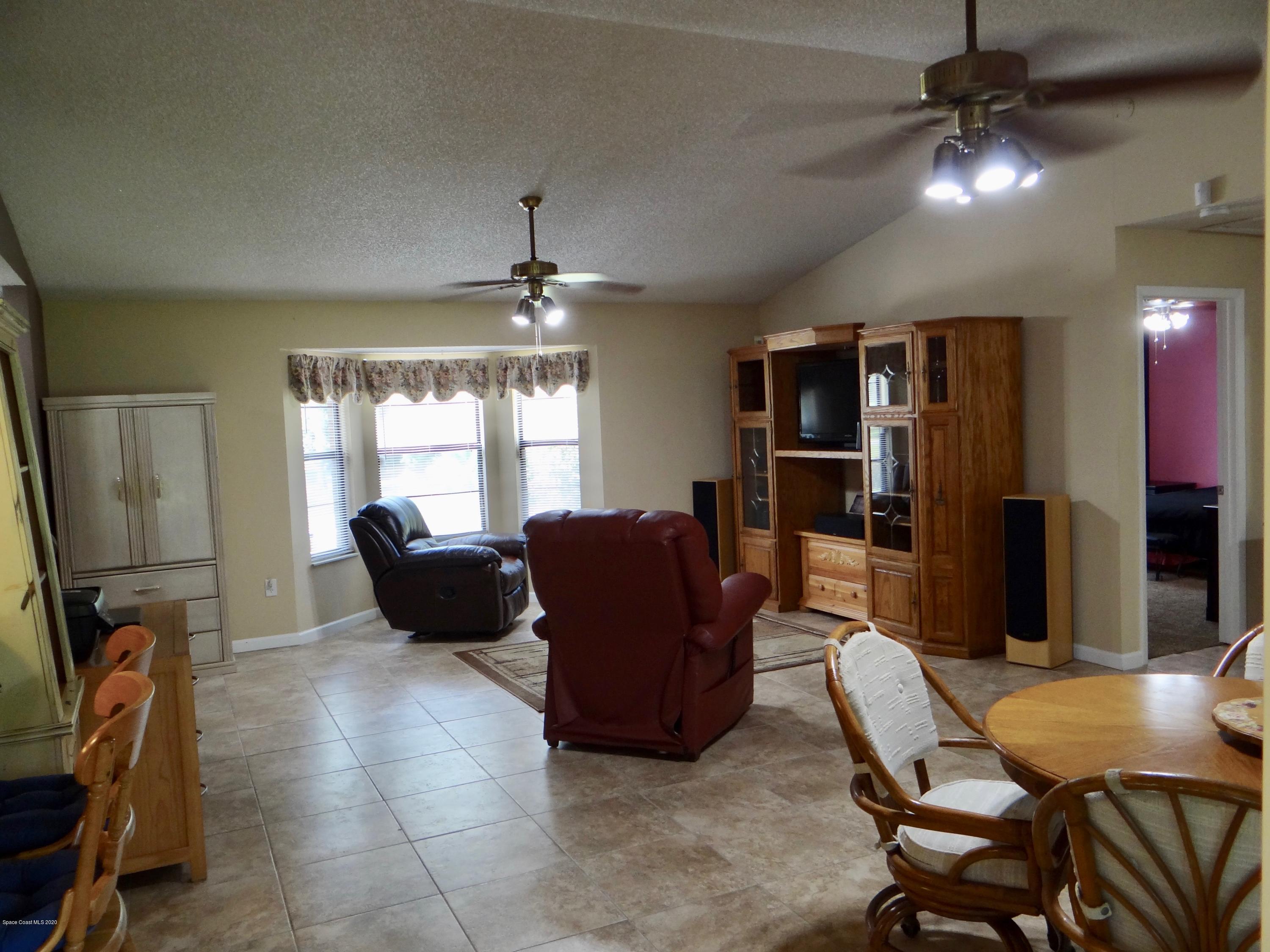 715 Seaton Road Southwest Palm Bay, FL 32908 - Photo 8 of 45 living 2