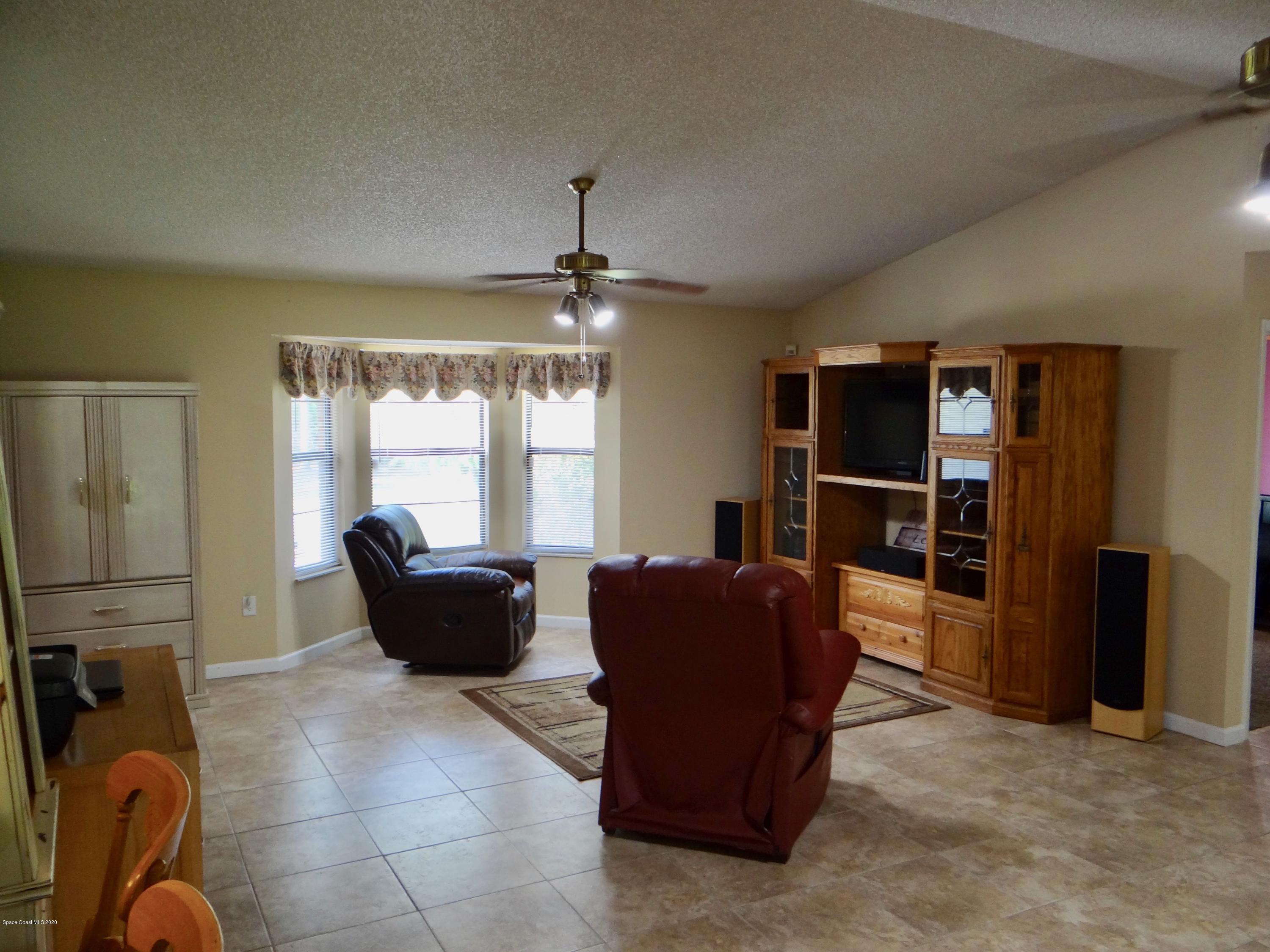 715 Seaton Road Southwest Palm Bay, FL 32908 - Photo 9 of 45 living