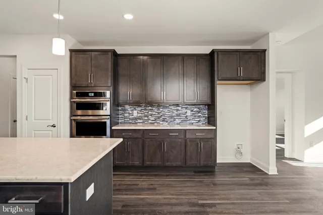 a kitchen with a sink and a window