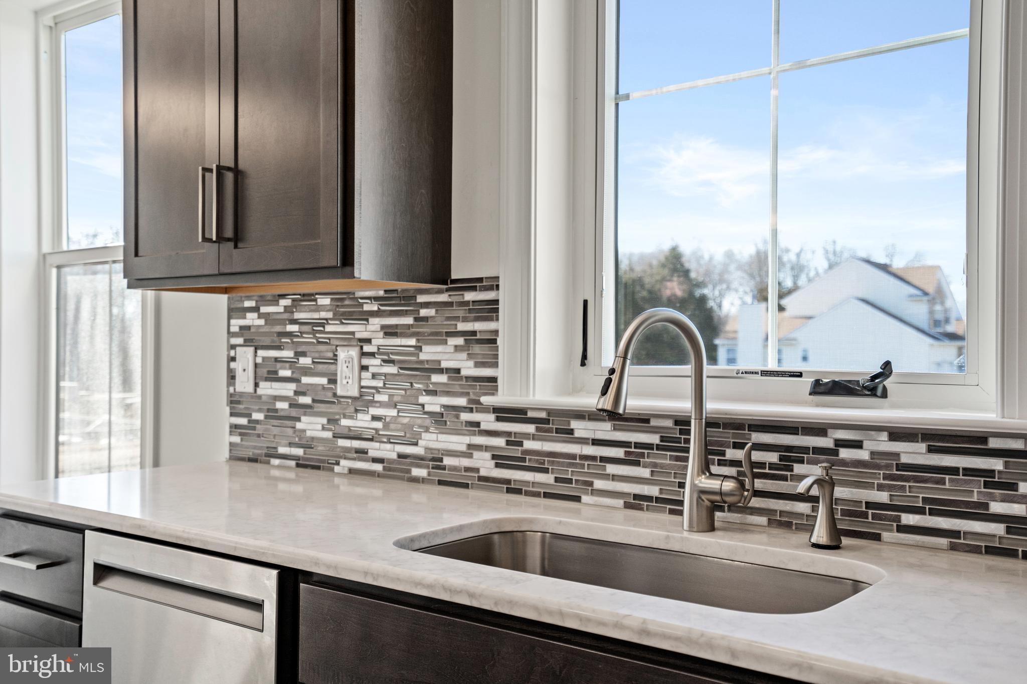 33 Kay Chiarello Way Hamilton, NJ 08690 - Photo 13 of 42 a kitchen with a sink and a window