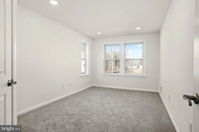 a view of an outdoor space and tennis court