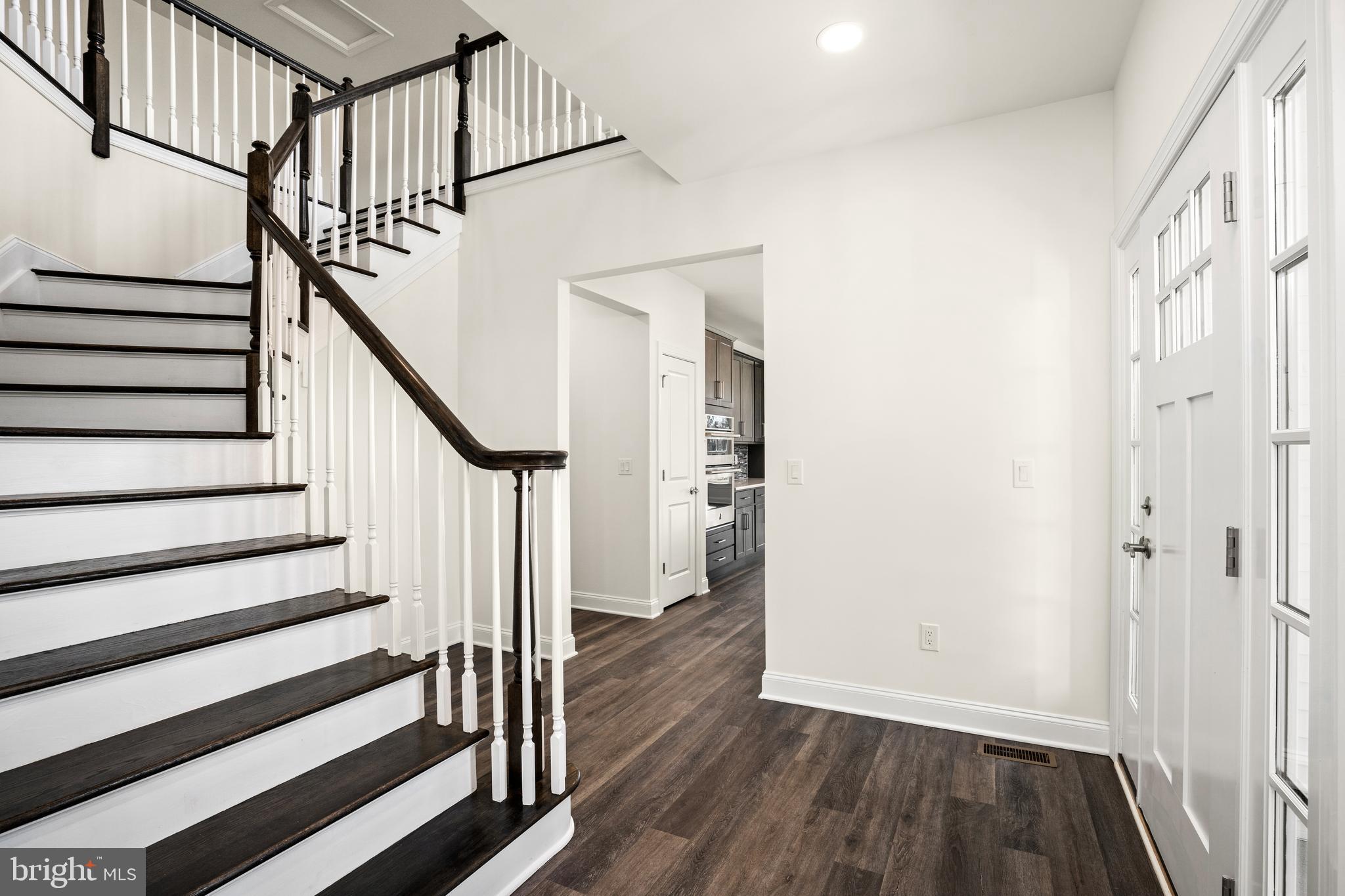 33 Kay Chiarello Way Hamilton, NJ 08690 - Photo 7 of 42 a view of entryway with wooden floor and stairs